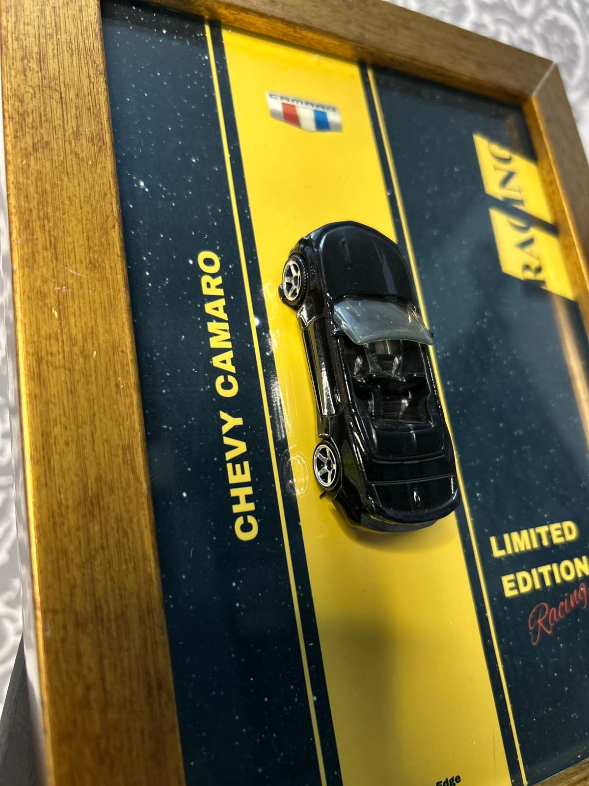 Chevrolet Camaro (Black) – 1:64 Hot Wheels in Premium Frame